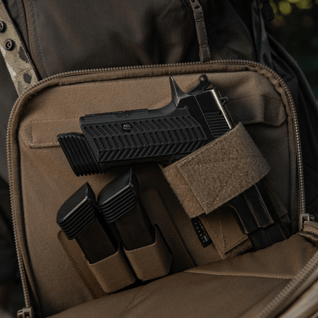 M-Tac Tablet Bag Laser Cut Hex med skjult våbenrum og modulære inserts, viser holdbar Cordura konstruktion og laserudskårne MOLLE paneler.