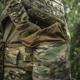 M-Tac Sukharka Gen.3 Pouch i brug på camouflagebeklædning, robust Cordura 500D materiale og MOLLE-interface til militær brug.