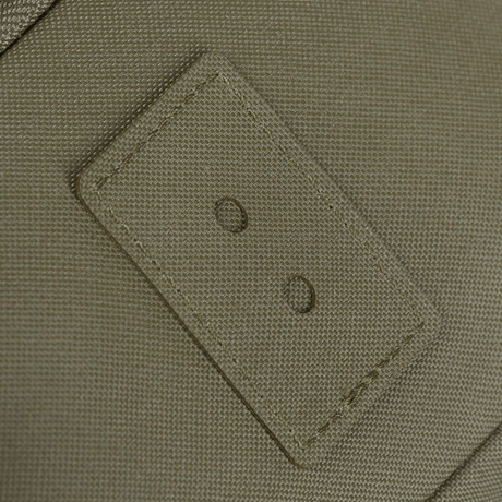 Nærbillede af grøn tekstur med trækhuller