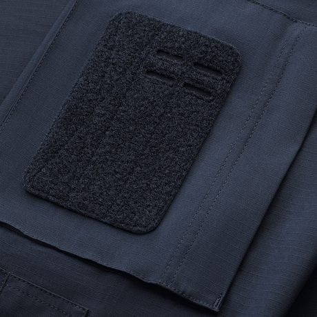 M-Tac Jakke Patrol Flex med Velcro-paneler og forstærket skulderparti, designet til taktisk brug, detaljeret i navy stof.