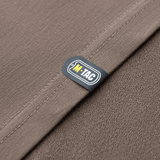 M-Tac Pullover 4 Seasons materiale detalje med label, neutral farve, minimalistisk design, alsidig til hverdag og taktisk brug, 95% bomuld.