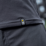 M-Tac Long-sleeve T-shirt 93/7 close-up showing logo on hem of quality stretchy fabric.
