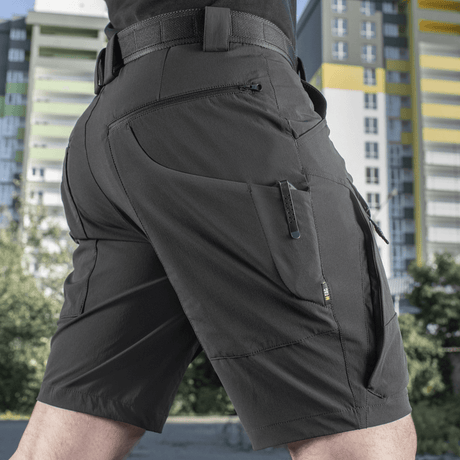 M-Tac Shorts Rubicon Flex i mørk oliven med cargo-lommer og 4-vejs stræk, perfekt til sommer og udendørs brug.