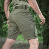 M-Tac Shorts Rubicon Flex i mørk oliven med cargolommer, designet til maksimal bevægelsesfrihed med vandskyende materiale.