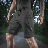 M-Tac Shorts Casual Fit Cotton i sort med sidelommer og elastik i taljen, perfekt til sommeraktiviteter i naturen.