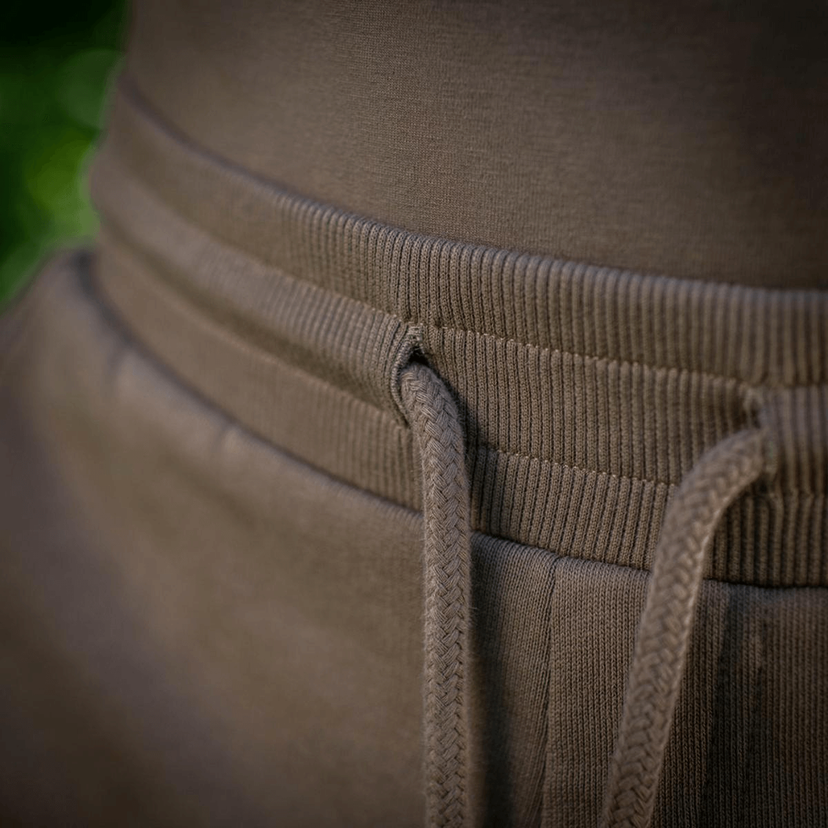 Nærbillede af elastisk talje på M-Tac Shorts Sport Fit Cotton, perfekt til sport og hverdagsbrug, fremstillet i åndbart bomuld.