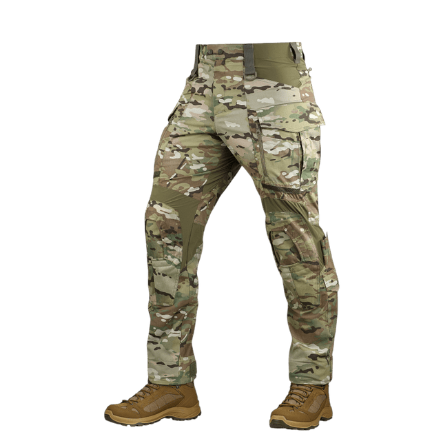 Multicam militærbukser med camouflagedesign og praktiske lommer, velegnet til udendørs brug og kampaktiviteter.