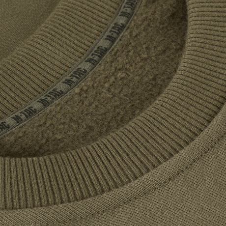 Nærbillede af M-Tac Sweatshirt Cotton Hard i 100% bomuld med ribkantdetaljer og reflekterende logo