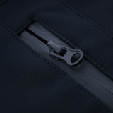 Nærbillede af lynlås på M-Tac Bukser Soft Shell Vinter, som viser slidstærk softshell og fleecefor.