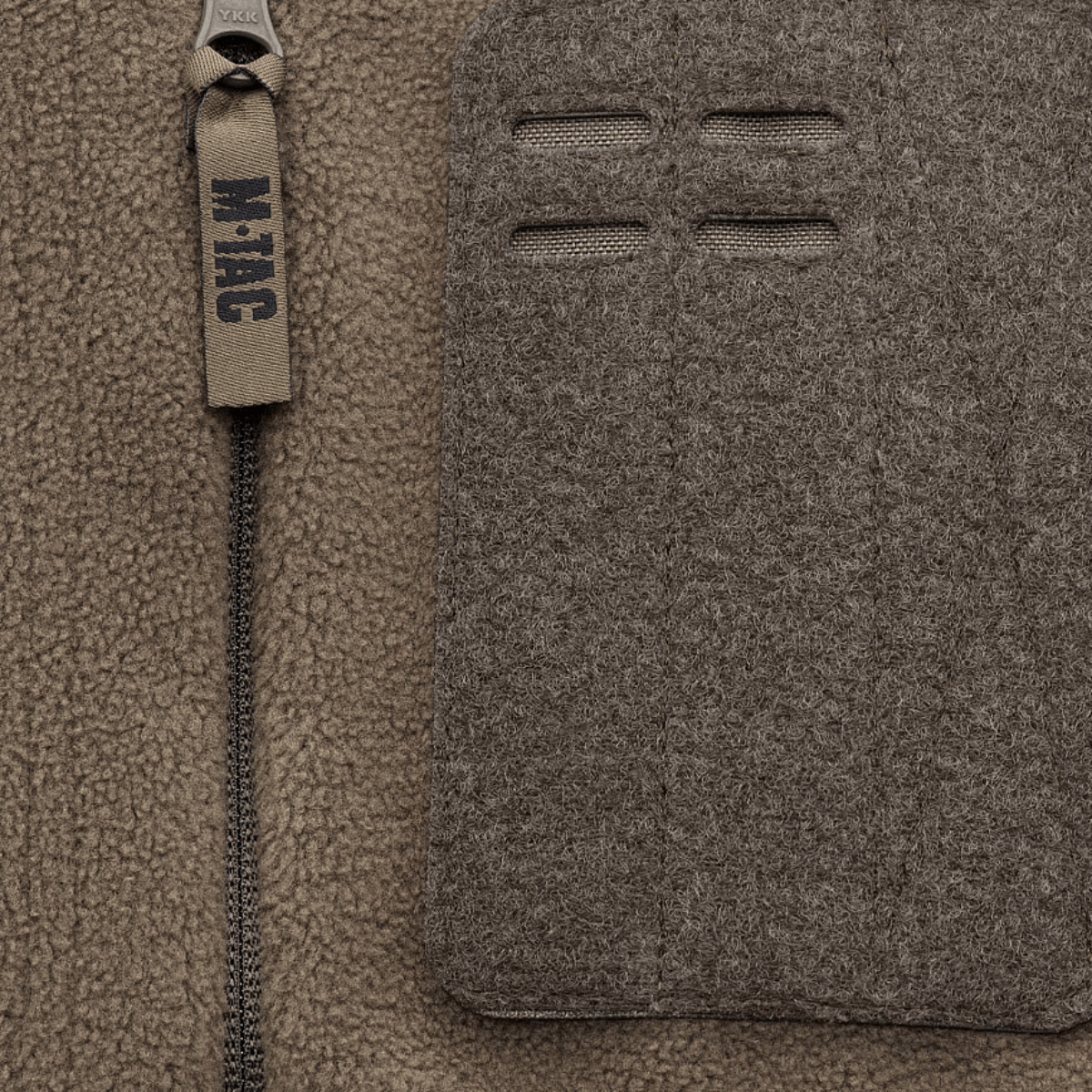 Nærbillede af M-Tac Alpha Microfleece Jakke Gen.II med forstærket fleece og Oxford nylon detaljer til taktisk brug i koldt vejr.