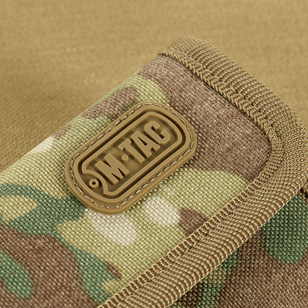 M-Tac Pung Elite Gen.II i slidstærkt Cordura 500D med stilfuldt M-Tac logo og camouflagemønster, perfekt til kort og kontanter.