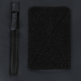 Detalje af M-Tac Alpha Gen.III Pro Vinterjakke med vandtæt lynlås og velcrostruktur, fremhæver jakken's funktionalitet.