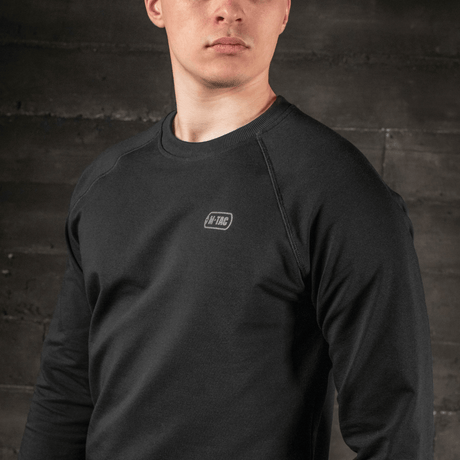 M-Tac Raglan Athlete sweatshirt i sort med raglanærmer, rund hals og logo.