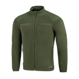 M-Tac Combat Fleece Polartec Jakke i grøn, varm og slidstærk, ideel til taktisk og casual brug med YKK lynlåse og elastiske manchetter.
