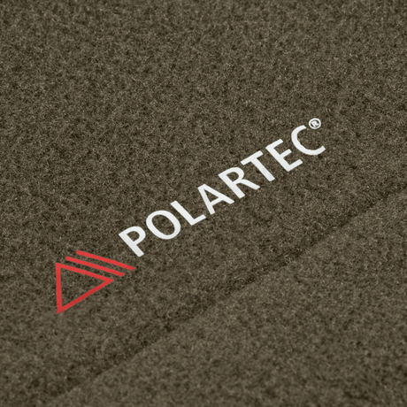 Detalje af Polartec® materiale fra M-Tac Sweater Nord Fleece Polartec Dame, der viser blød og holdbar tekstur.