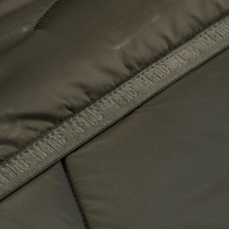 Detaljebillede af M-Tac Damevest Primaloft med nylonstof og moderne design
