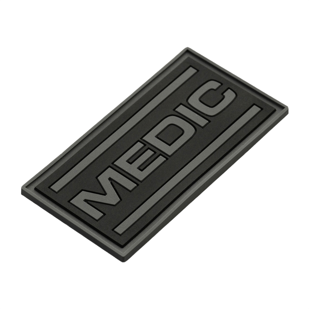 M-Tac Patch Medic PVC 3D taktik patch med velcro, med sort design og 3D-effekt. Dimensioner: 70 x 35 mm. Perfekt til uniformer og tasker.