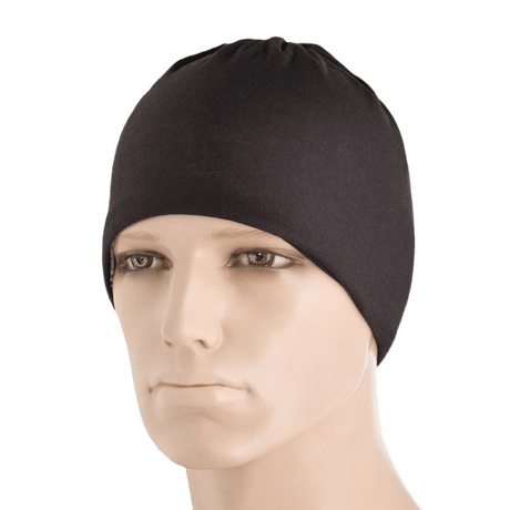 Mand iført M-Tac Let Tubehalstørklæde Reaper Skull som hue. Multifunktionelt tilbehør til sport og daglig brug.