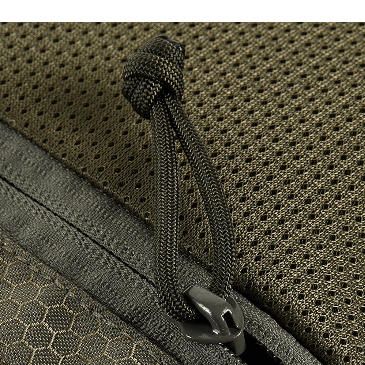 M-Tac Konvert Taske Elite detalje med robust Cordura materiale og lynlås, der viser taskens høje kvalitet og holdbarhed.