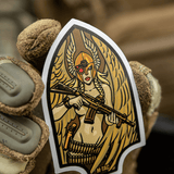 M-Tac Sticker Valkyrie viser krigsgudinde med normannisk hjelm og M4 gevær, inspireret af Arrowhead patchen. Perfekt til dekoration.