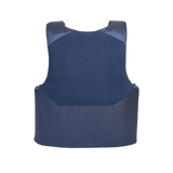 Anorak Concealable I Cover i blå med lav profil og justeringssystem, designet til skjult bæring og maksimal beskyttelse under tøj.