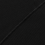 Sort fleece detalje på M-Tac Vinter Termobukser 3/4 Baselayer med flade sømme, fremstillet af Pontetorto® materiale.