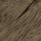 Nærbillede af M-Tac Sweating Ninja-Balaclava i brun polyester, der viser stoffets åndbare struktur til udendørs aktiviteter.