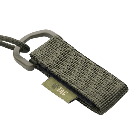 M-Tac Safety Cord med D-ring til sikring af udstyr, spiralformet paracord og PVC, MOLLE-montering, forhindrer tab eller tyveri af genstande.