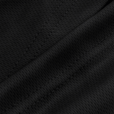 Nærbillede af M-Tac Sweating Ninja-Balaclava's polyesterstof, der effektivt transporterer fugt og beskytter mod støv.