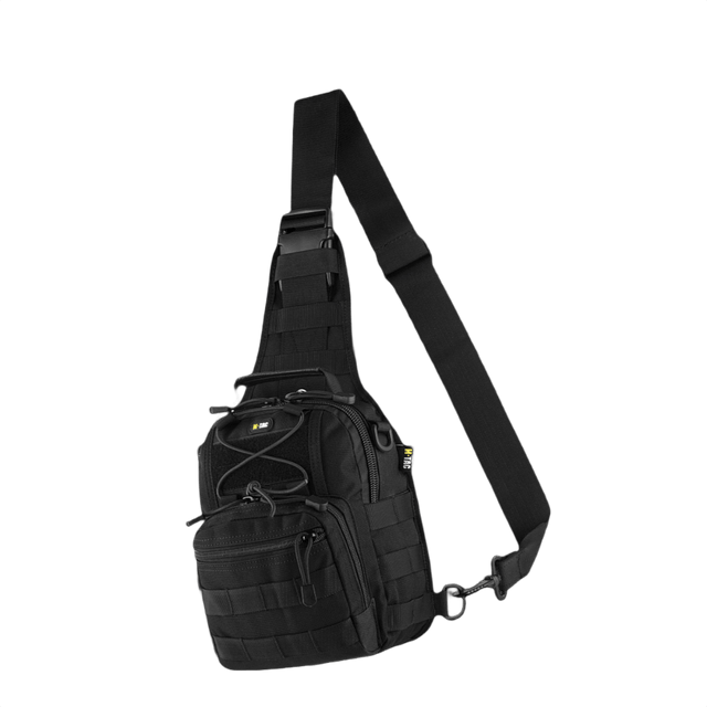 M-Tac Urban Line City Patrol Fastex Taske i sort, hybrid mellem taske og rygsæk med vandafvisende 600D polyester og PVC-coating.