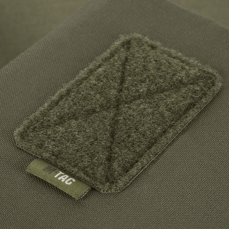 M-Tac Utility Taske Elite Small i Cordura 500D med Laser Cut MOLLE-system, tæt på visning af forstærket panel.