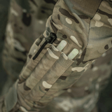 Taktisk lomme på M-Tac Jakke Sturm Gen.II NYCO Extreme med camouflagemønster og lommer til udstyr, ideel til udendørs aktiviteter.