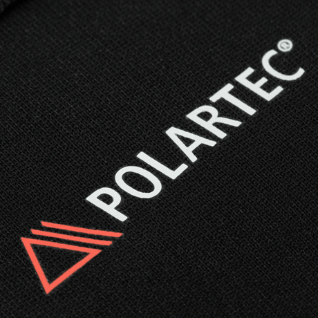 Polartec-logo på M-Tac Level I Polartec Thermal Bukser stof, viser holdbarhed og kvalitet af Power Dry® materiale.
